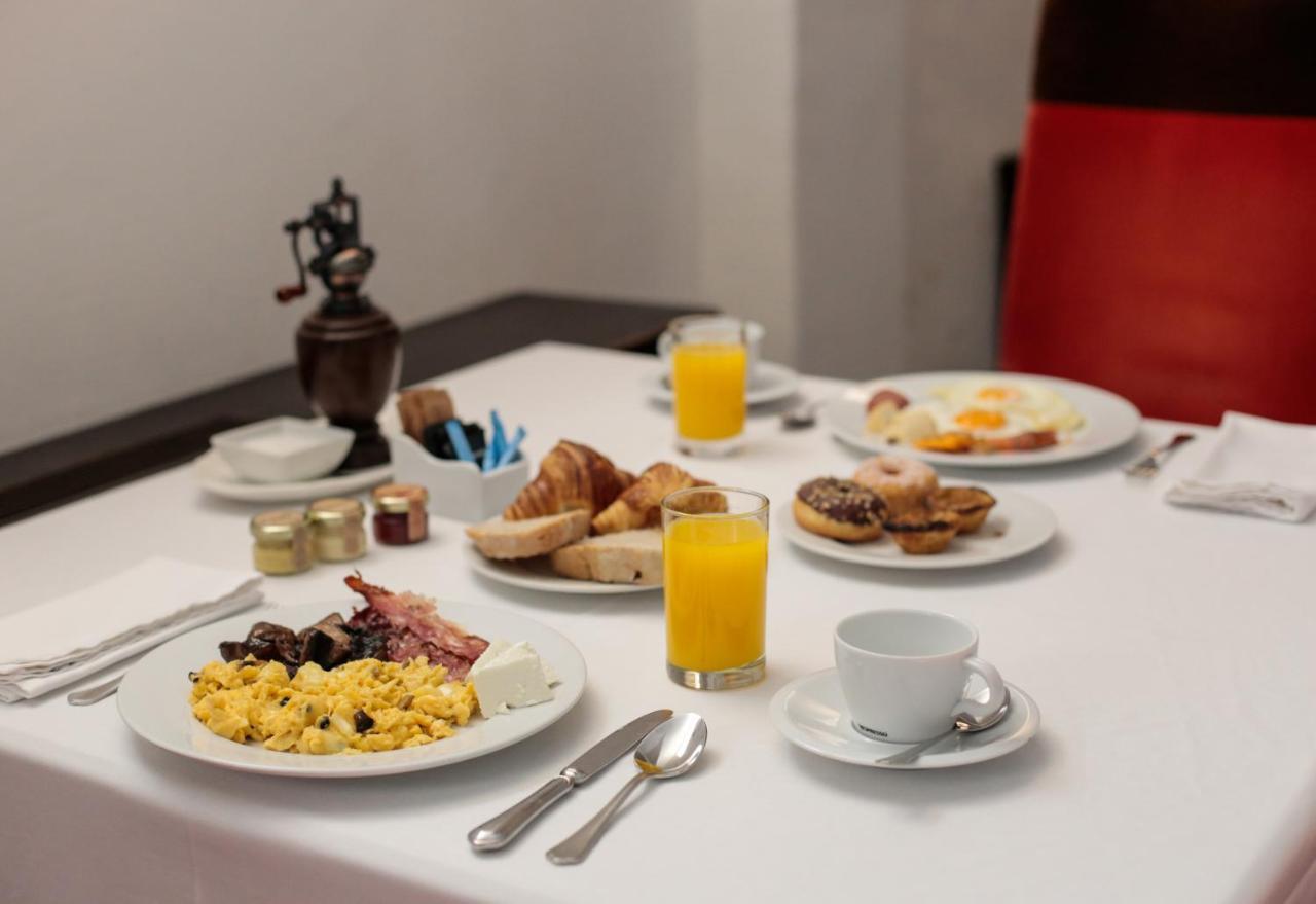 Convento Do Espinheiro, Historic Hotel & Spa Эвора Экстерьер фото A breakfast table
